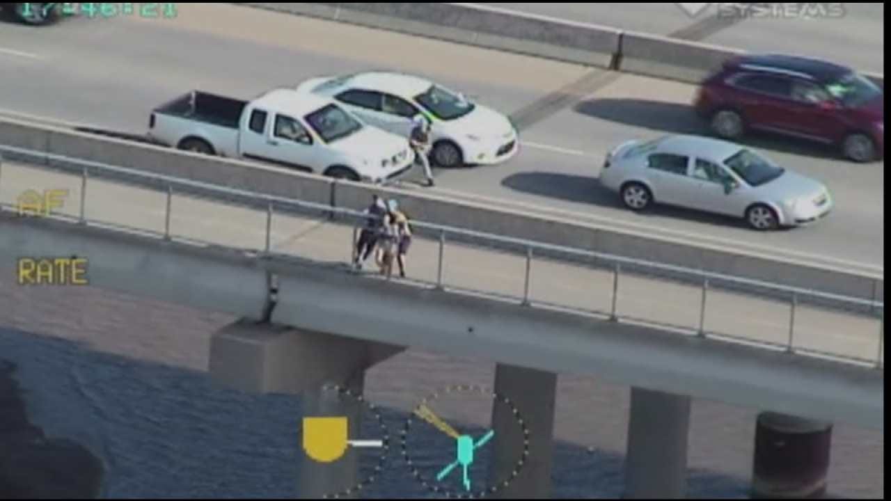 TPD Releases Video Of Men Stopping Woman From Jumping Off Bridge TPD Releases Video Of Men Stopping Woman From Jumping Off Bridge