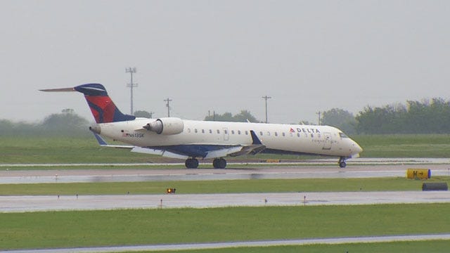 Woman Claims Delta Kicked Her Off Flight Over Crying Kids